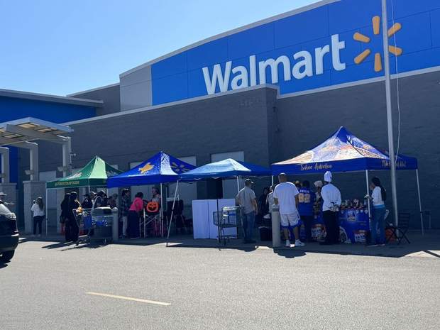 Community event outside a Walmart store in Houston